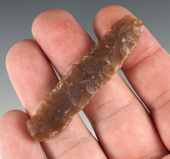 2 1/2" Paleo Knife found in South Dakota. Made from Knife River Flint.