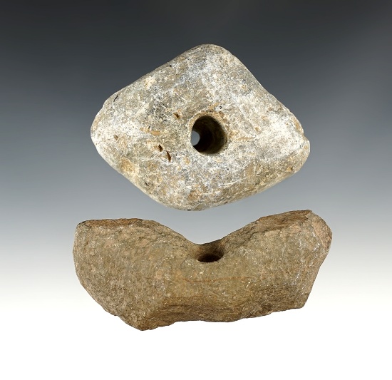 Pair of stone relics including an unfinished Bannerstone and a drilled artifact. Found in Maryland.