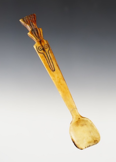6 1/8" carved and beautifully decorated spoon made from bone. Broken and glued.