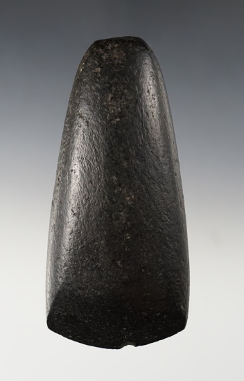 Exceptional 4 3/4" celt made from patinated black stone. Found in the Midwestern U.S.