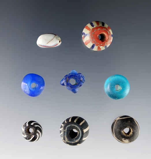 Set of 8 large Drawn Beads found at the Townley Reed Site, Geneva, New York. Circa 1710-1745.