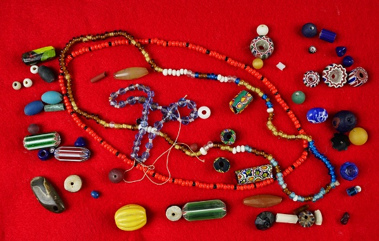 Frame of assorted vintage and contemporary beads.