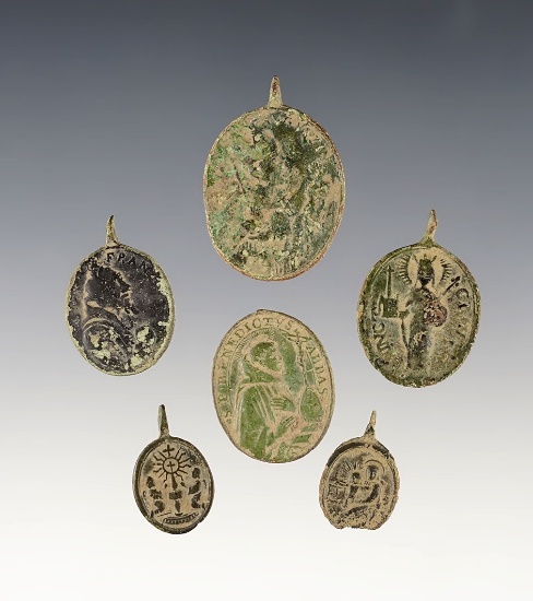 Set of 6 religious trade medals recovered at the White Springs Site in Geneva, New York.
