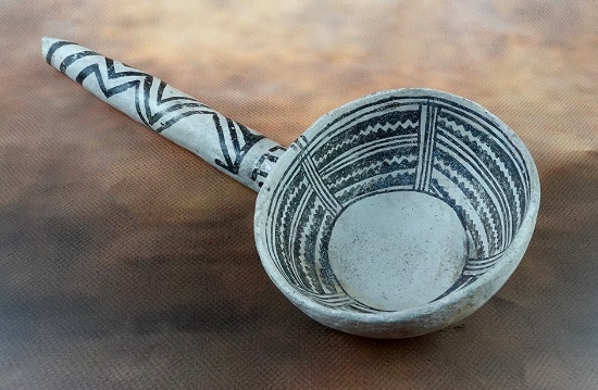 12 1/2" long by 5 1/2" wide Anasazi Ladle with restoration to handle area.