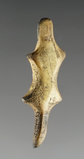 2" Lizard or Otter Effigy made from Bone. Tail has been glued tight, minor fire damage.