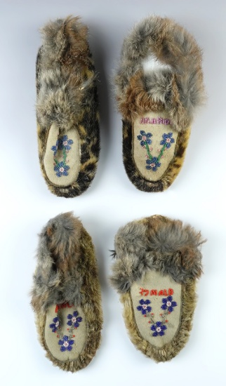 Two pairs of Vintage Moccasins made from fur and leather. The larger pair measures 7 1/2".