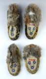 Two pairs of Vintage Moccasins made from fur and leather. The larger pair measures 7 1/2