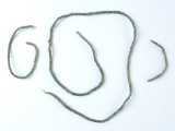 Set of three rare, very small Micro Brass Beads with original thread.  Burrell Creek Site, NY.
