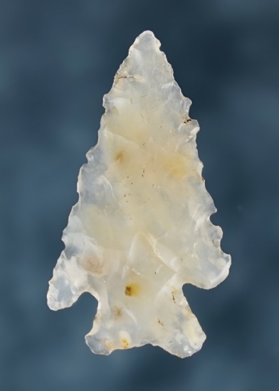 Serrated 1 3/8" Glendo Dart Point made from Agate. Found in the Colorado/Wyoming area.