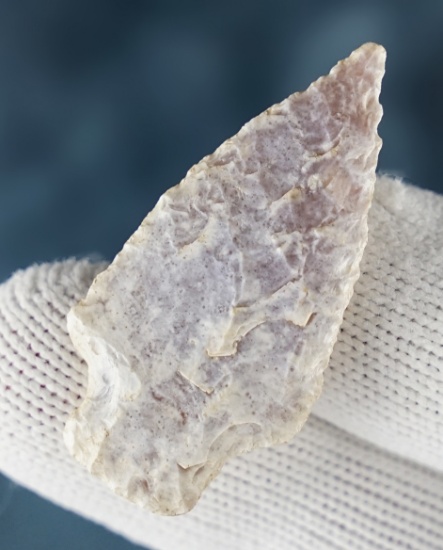 1 9/16" heavily patinated Horse Fly Point made from Chalcedony. Found in western Nebraska.