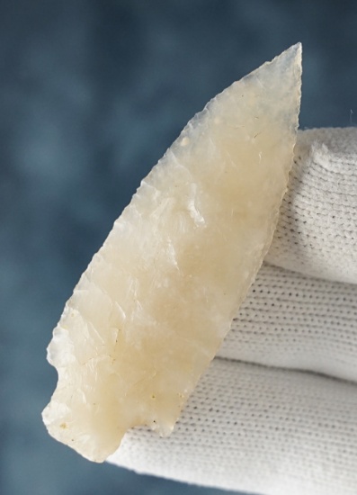 Highly translucent 2 3/8" unclassified Stemmed Dart/Knife found in Lincoln Co., Nebraska. COA.