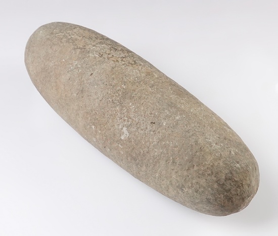 8 7/8" x  2 3/4" Roller Pestle that is nicely made from patinated Hardstone. Found in Ohio.