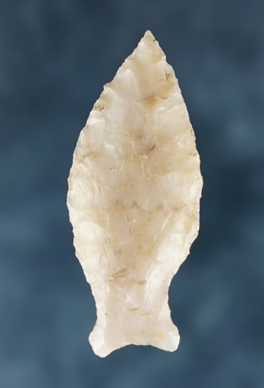 1 1/2" Fishtail Dart Point made from nicely patinated Chalcedony. Ex. Charlie Mitchell. TLM.