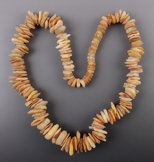 24" strand of drilled Quartz Disc Beads recovered in Mauritania, North Africa. Solutrean Period.