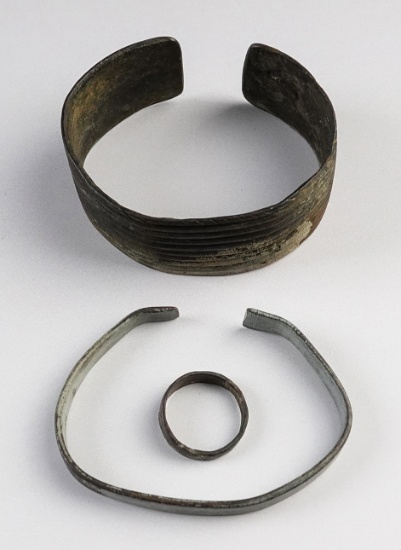 Set of three Brass Trade items including a ring, an arm band and a bracelet, North Dakota.