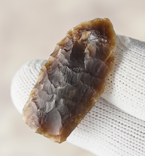 1 7/16" Paleo Hell Gap made from well patinated Knife River Flint. Found in North Dakota. COA's.