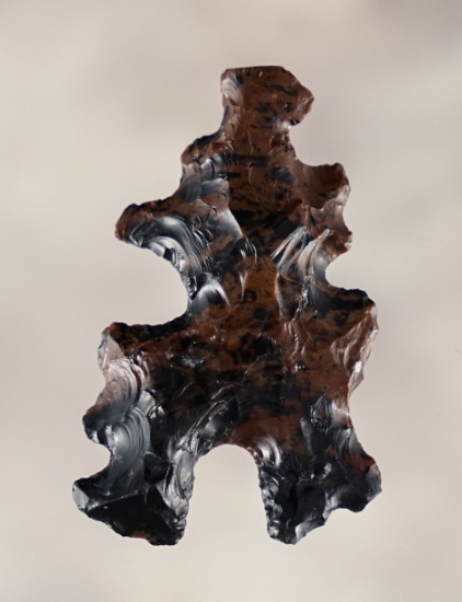 Unique 1 1/2" Eccentric Ornament with suspension notches. Made from Mahogany Obsidian.
