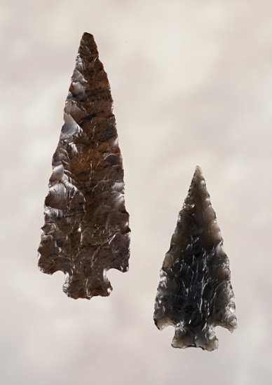 Nice pair of Rose Springs Points, one is made from Mahogany Obsidian. Larger is 2". California.