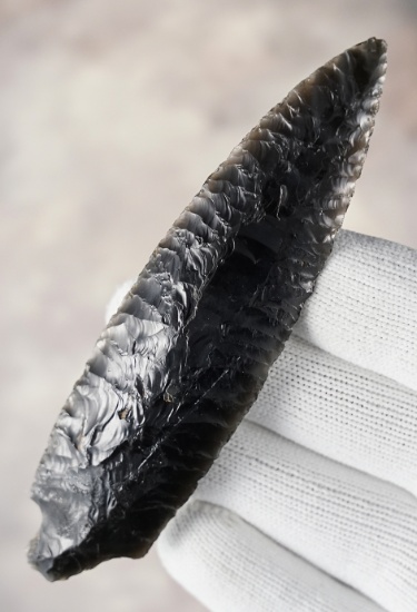 4" Chilcotin Plateau made from Obsidian. The stem is missing one corner. Found in Oregon. COA.
