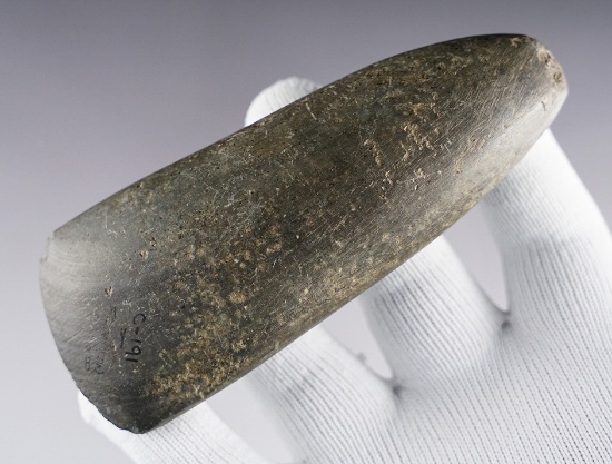 4 7/8" Ohio Celt made from Banded Slate. This is an uncommon material for this artifact type.