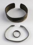 Set of three Brass Trade items including a ring, an arm band and a bracelet, North Dakota.