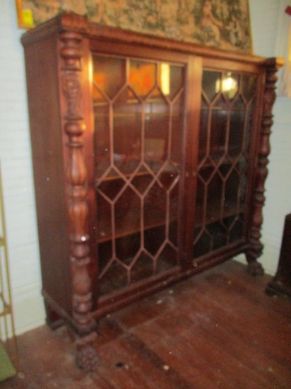 Antique Curio Cabinet with Bump Out Carved Post and Lion Feet on Casters