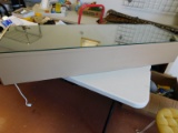 Mirrored Cabinet Holds Ironing Board
