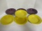 Four Yellow Fiesta Ware Bowls and Three Plum Fiesta Ware Bowls