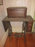Antique Wilcox & Gibbs Peddle Sewing Machine in Wood Cabinet
