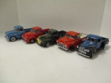 Five 1:24 Die Cast Trucks - Danbury Mint 1942 and 1956 Fords and 1941, 1957, and 1958 Chevrolets