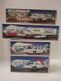Hess 1991 Toy Truck and Racer, 1992 18 Wheeler and Racer, 1993 Patrol Car and 1994 Rescue Truck