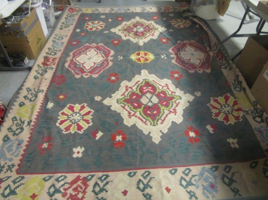 Woven Rug with Geometric Floral Design
