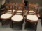 Six Wood Chairs with Caned Seats