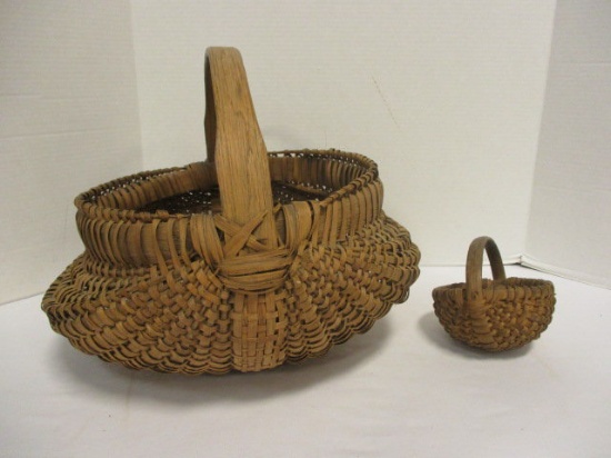 Two Vintage Oak Buttock Baskets