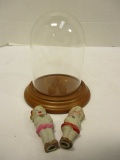Two Bisque Figurines with Display Dome