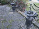 Pair of Metal Urns on Pedestals