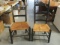 Two Woven Seat Wood Painted Black Chairs