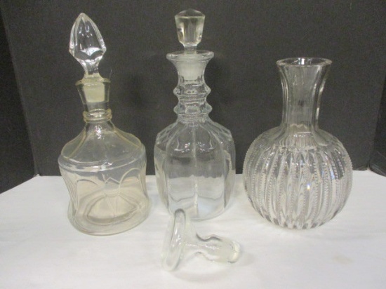 Three Clear Glass Decanters and Stopper