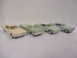Four Plastic Car Models