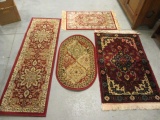 Four Small Area Rugs