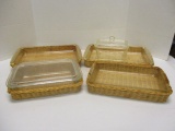 Four Pyrex Baking Dishes with Woven Carriers and Lidded Pyrex Dish