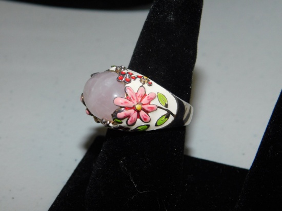Beautiful Ring Pinkish Stone incased in flower design
