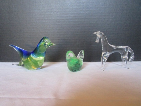 Two Glass Birds and One Glass Horse