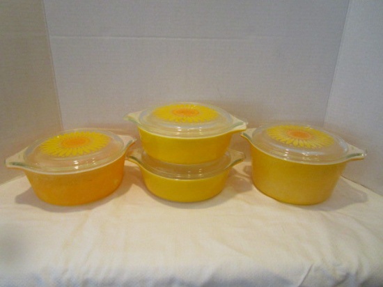 Four Pyrex Dishes with Lids