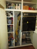 4 Cabinets Contents - Baking Trays, Casseroles, Brooms Mops, Vases Cleaning Products etc.