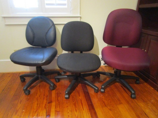 Three Rolling Office Chairs