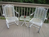 Two White Metal Bounce Chairs and Small Table