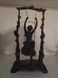 Girl in Swing Metal Sculpture