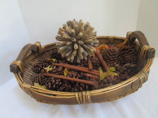 Oval Woven Basket with Wood Handles, Pine Cones, Cinnamon Sticks, etc.