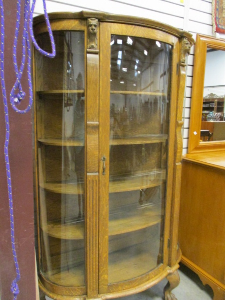 Lot Oak Curved Curio Cabinet With Lion Heads And Claw Feet Oak Curved Curio Cabinet With Lion Heads And Claw Feet